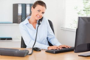 Focus on the patient when answering dental office phones.