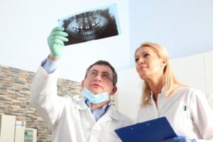 X-rays should be included when sending dental claims even when a pre-estimate has been done prior.