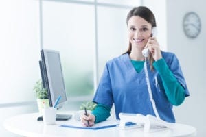 The dental front office greets patients on the phone and in person